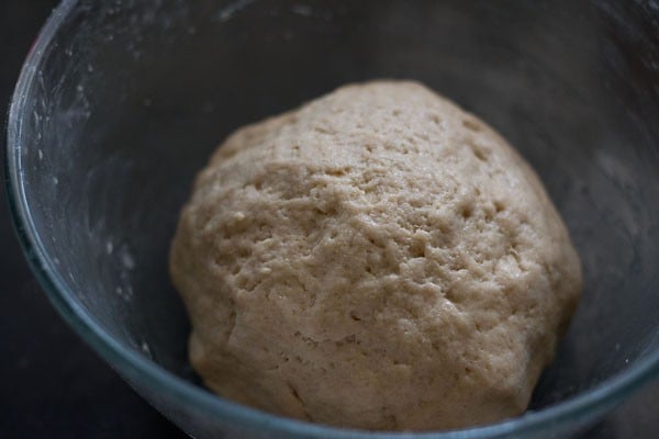 kneaded dough placed in a bowl. 