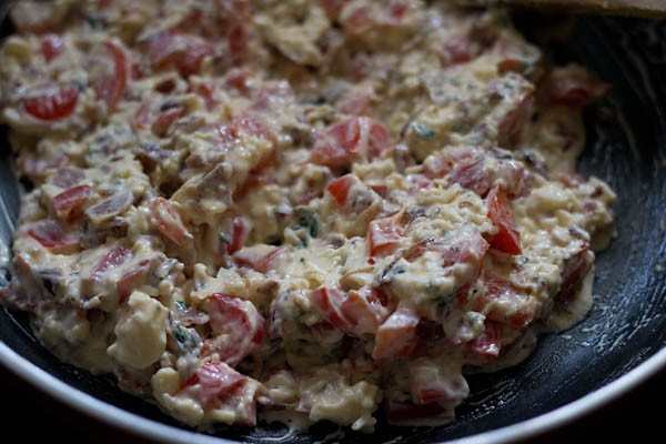 cooked stuffing mixture for calzone pocket. 