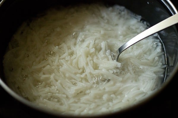 cooking falooda sev in hot water. 