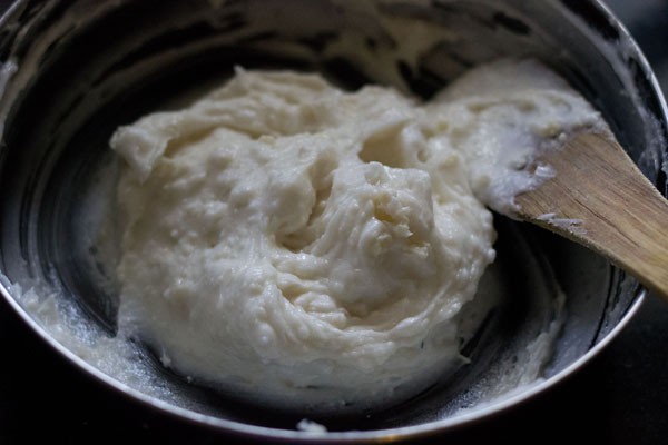 mixing mawa with butter-sugar mixture