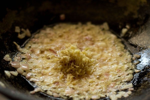 sauteing ginger-garlic paste in the pan