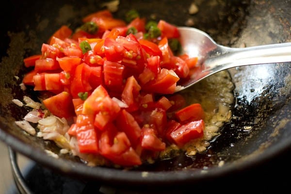 added 3 medium-sized finely chopped tomatoes