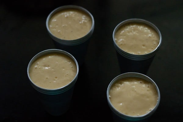 mango kulfi mixture in moulds