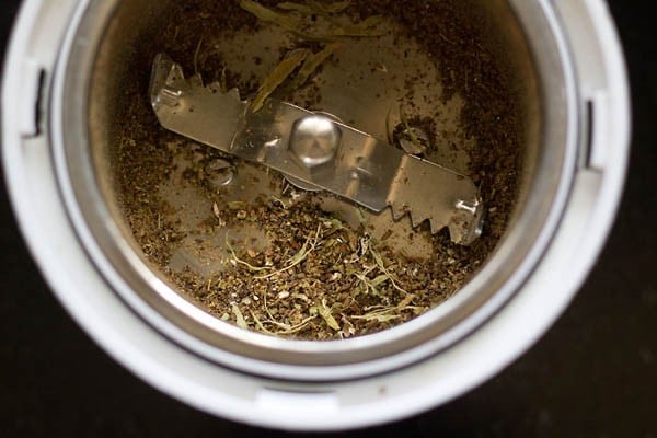 spice powder in grinder jar