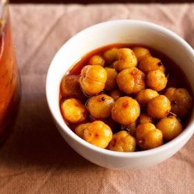 star gooseberry pickle in a white bowl.