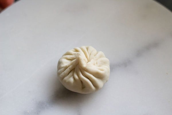 a well pleated and shaped momo to make momos recipe