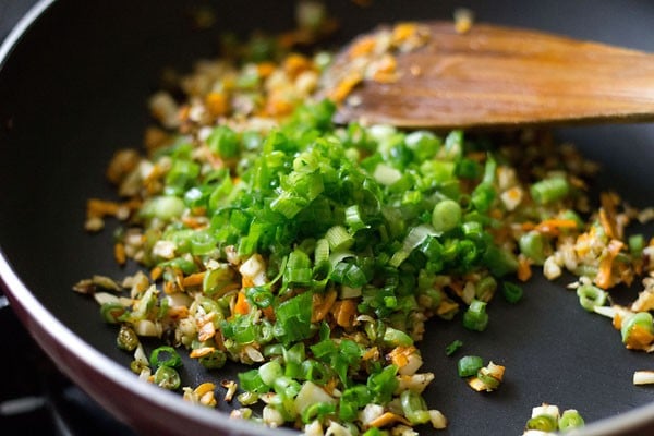 added chopped spring onion greens to the stir fried veggies