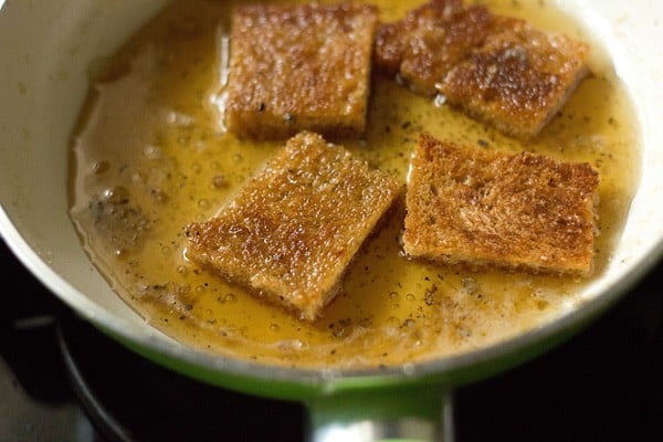 pan fried bread slices in sugar syrup for making shahi tukda recipe