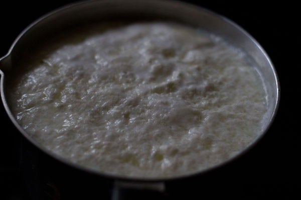 pour curdled milk - making chenna for sweets