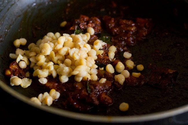 reserved cooked chana dal added to the pan. 