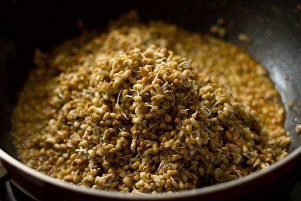 sprouted matki or moth beans added to masala to make matki recipe. 