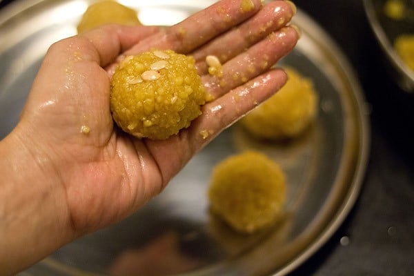 shaped motichoor ladoo in a palm