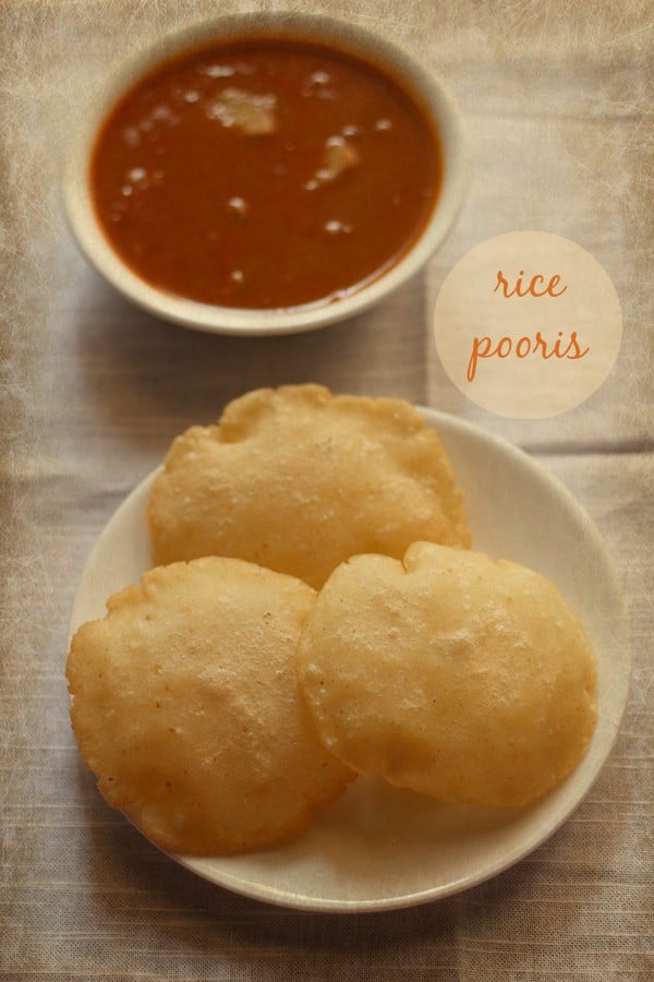 rice puri served on a ceramic plate with a curry in a bowl kept on the top and text layovers.