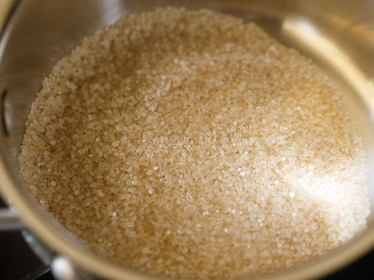 sugar taken in a pan or saucepan