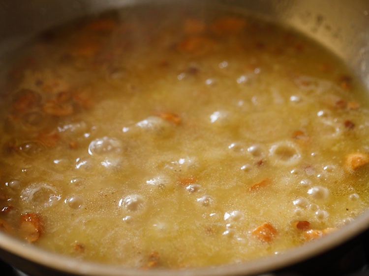 suji halwa mixture getting cooked