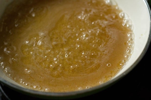 sugar syrup comes to a simmer