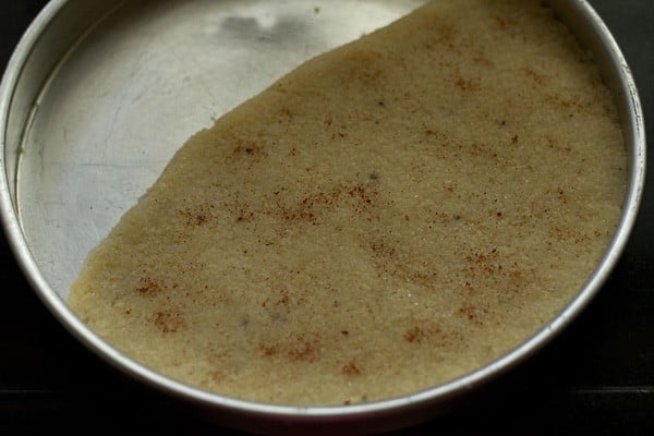 ground saffron sprinkled on coconut barfi.