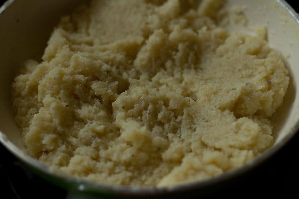 thickened the coconut burfi mixture in pan.