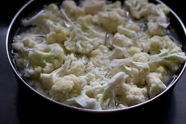 blanching cauliflower florets in hot salted water. 