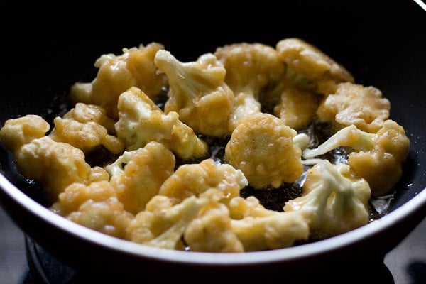 frying gobi florets until golden