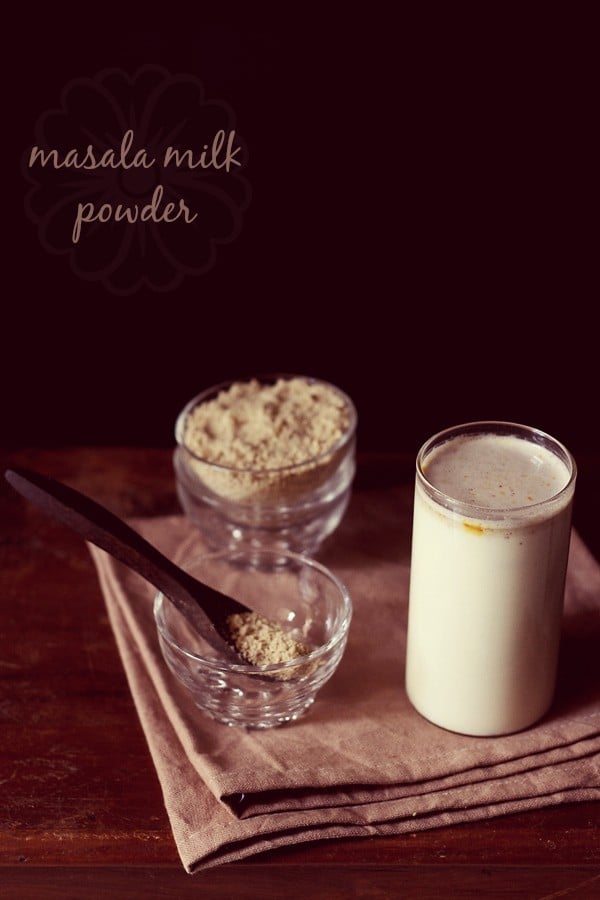 milk masala powder in a bowl, in a spoon kept in a bowl and a glass of masala milk with text layover. 