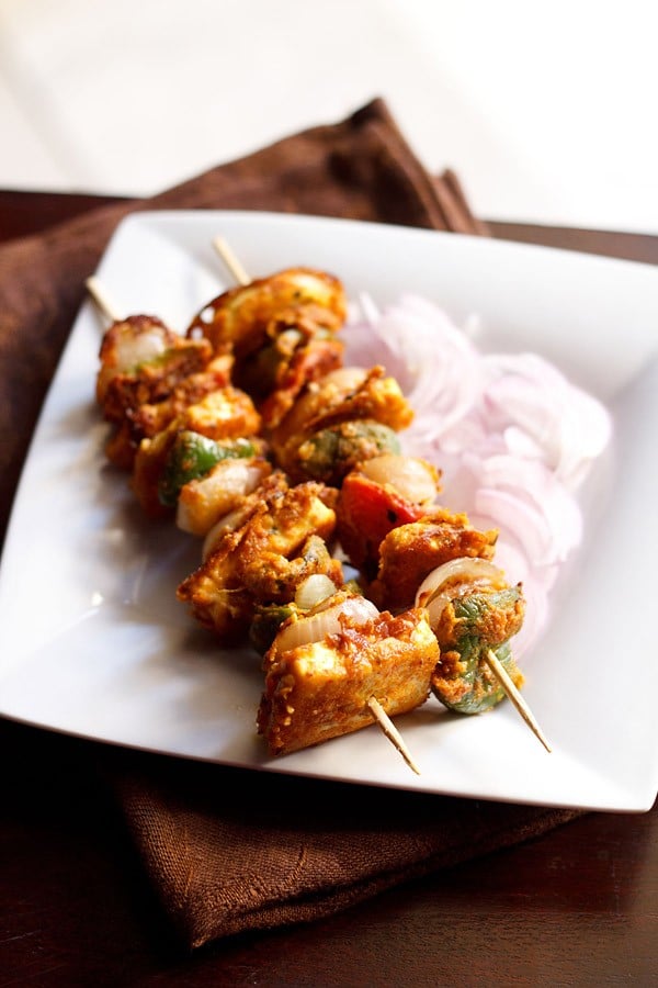 paneer tikka served on a plate