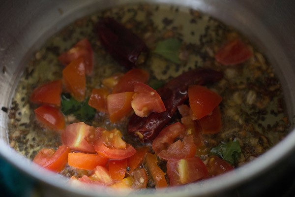 chopped tomatoes added to the hot oil. 