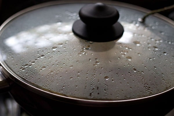 cooking vangi bath in the covered pan. 