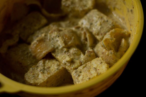 marinated paneer cubes and veggies in the bowl