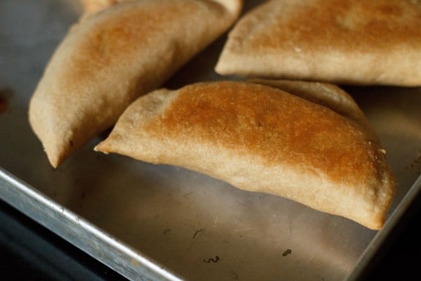 baked gujiya in the baking tray