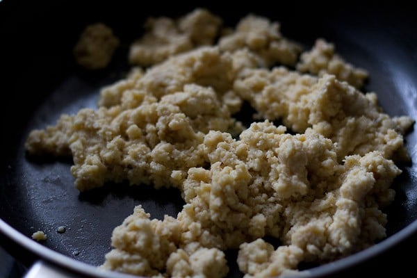 cooking khoya for khoya burfi. 