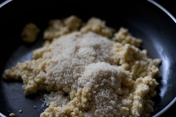 sugar added to cooked khoya for khoya burfi. 