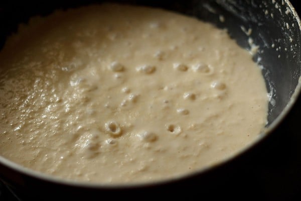 simmering milk is becoming very thick.