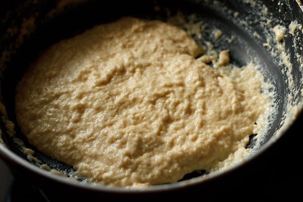 mawa or khoya after cooking; it is thick and solid and looks like a batter.