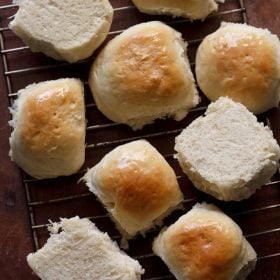 pav brushed with melted butter and kept on a wire rack.