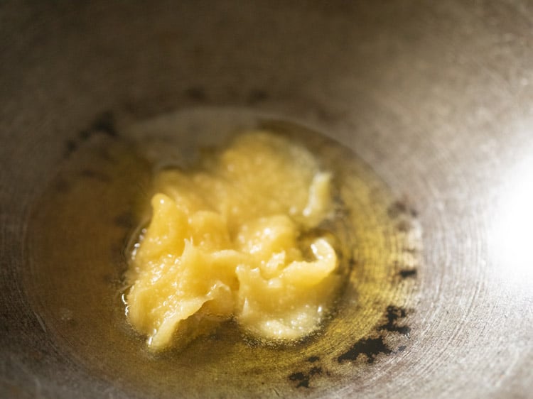 heating ghee in the same heavy pan. 