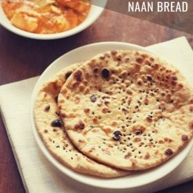 butter naan served on a white plate with a bowl of curry kept on the top left side and text layovers.