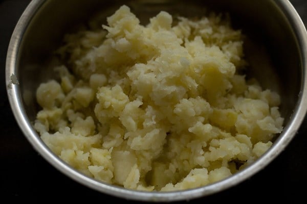 peeled potatoes in a bowl