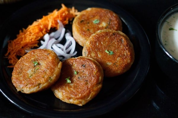 cooked aloo tikkis on a plate