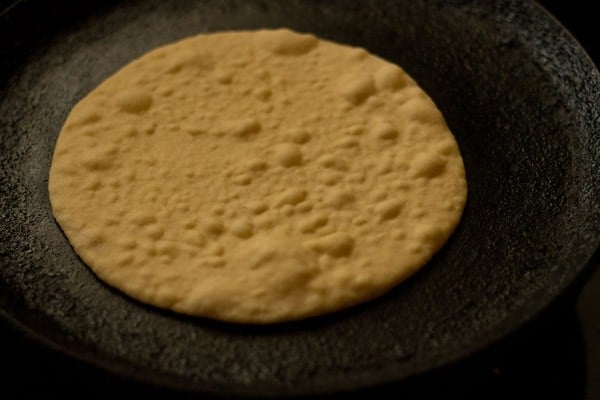 butter naan on tawa. 