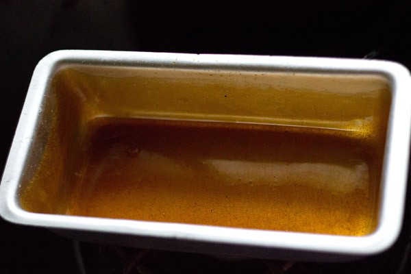 caramel sauce cooling in rectangular pan.