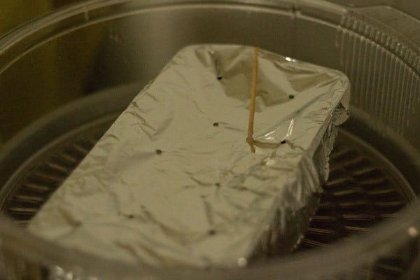 pan placed in steamer pan in electric cooker.