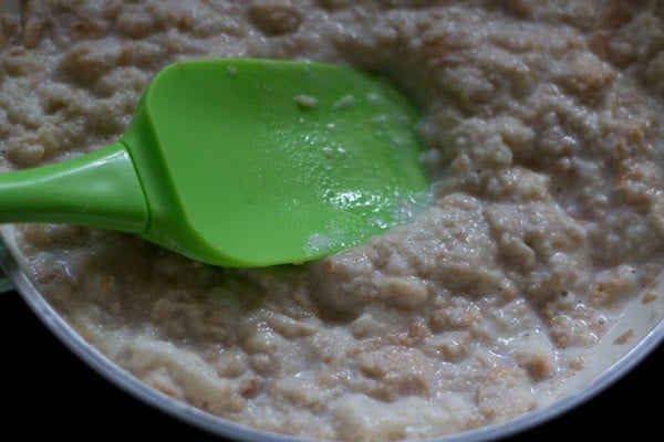 mash bread slices to make pudding mixture.