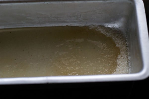 sugar and water in a rectangle baking pan.