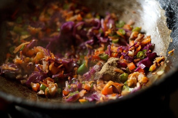 stir frying veggies to prepare veg manchow soup recipe