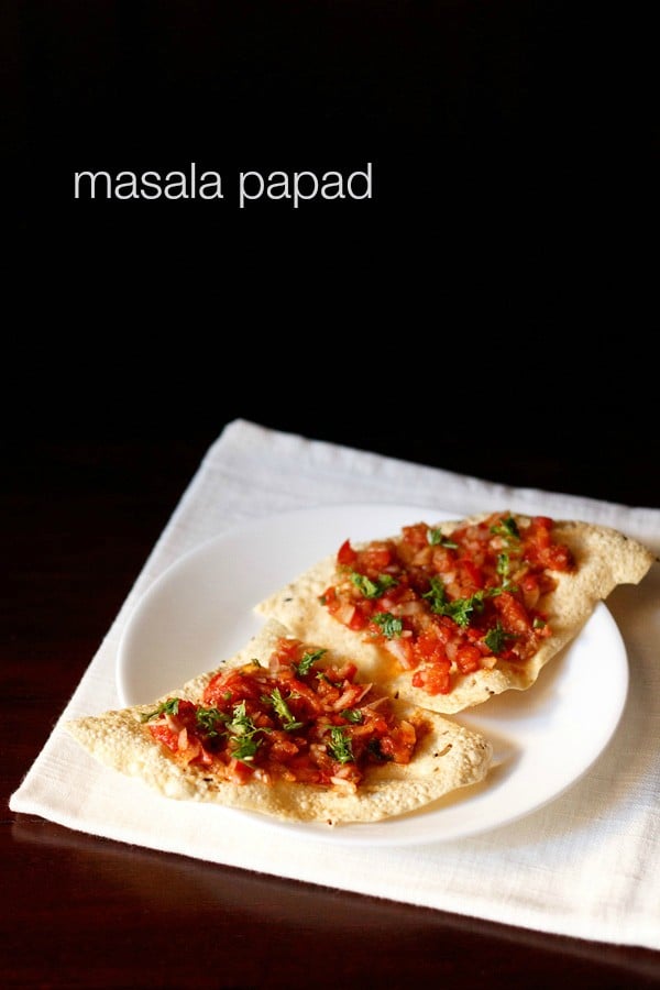 masala papad pieces served on a white plate with text layover.