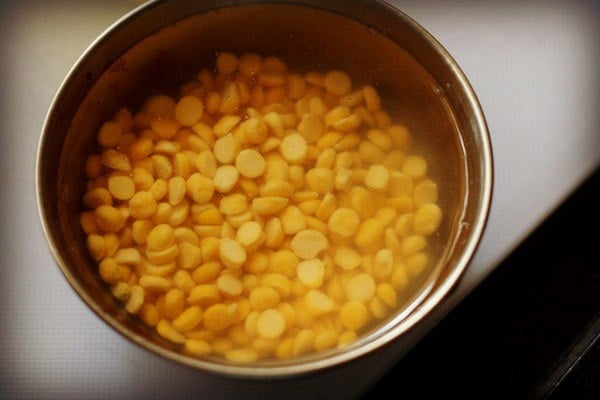 soaking bengal gram in hot water for making potato masala for dosa. 