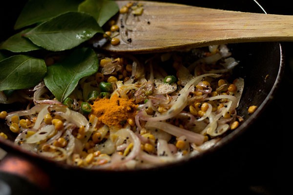 add curry leaves - making potato masala recipe