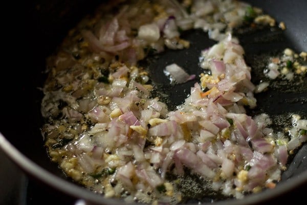 add onions - making veg chowmein noodles recipe
