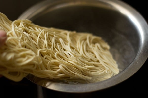 noodles added to boiling water